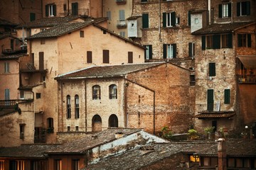 Fototapeta na wymiar Old building background Siena Italy