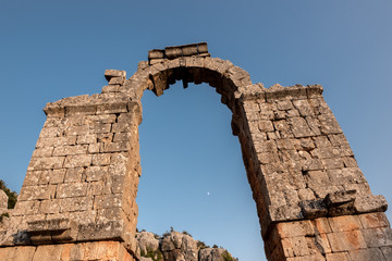 With blue sky,view of aqueducts or water bridges at  Olba Ancient city located in Uzuncaburc,Silifke,Mersin,Turkey..