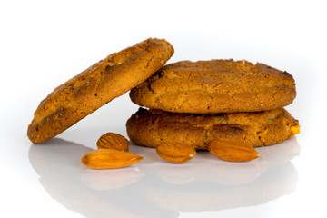 oatmeal cookies with almond nuts isolated on white background