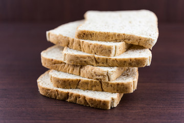 Sliced Whole wheat bread on wood table