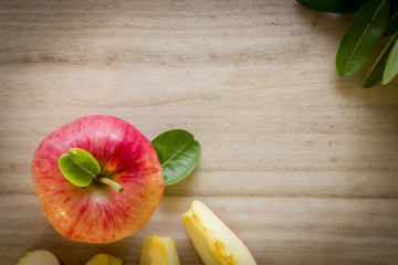 Apple top view with wooden background