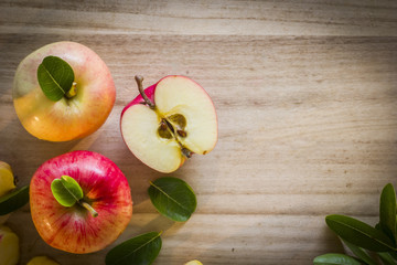 Apple top view with wooden background left side