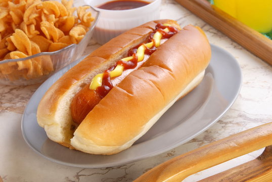 Hot dog with mustard and ketchup