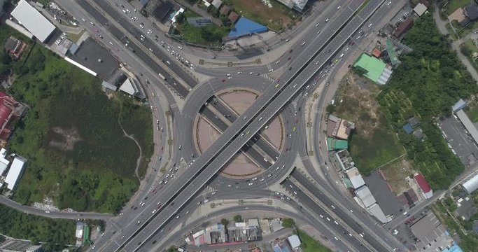zoom in aerial timelapse scene of the huge roundabout rama V road junction, Bangkok, Thailand