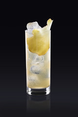 Iced tea with ginger on black background