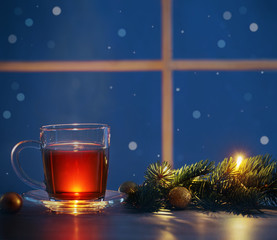 cup of tea  on background night window