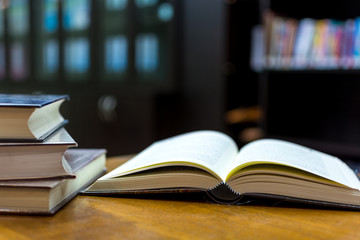 Open book on table , Selective focus.