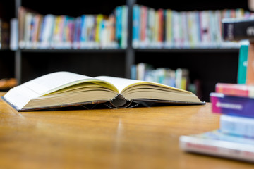Open book on table , Selective focus.