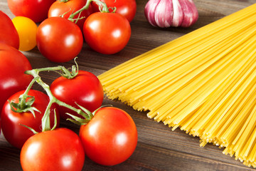 Spaghetti with ingredients for cooking pasta.