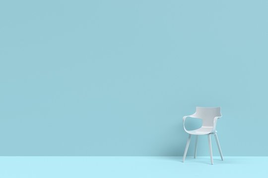 White modern arm chair in mint blue living room with free copy space. minimal style concept.