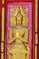 close up doors bass-relief in Beautiful temple Wat Samai Kongka on Ko Pha Ngan, Thailand.