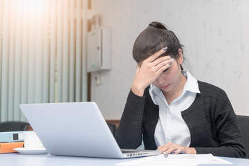 business woman touching her forehead, headache concept