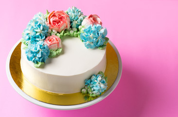 cute flower cake on cake stand