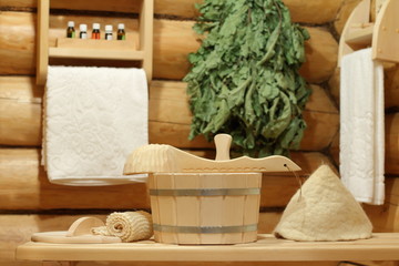 Interior of  sauna and bath accessories. Bath accessories in the log corner of  the room of the Russian bath.