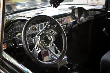 Isolated Interior View of Restored Tricked Out Vintage 50s Automobile Dashboard, Steering Wheel, ...