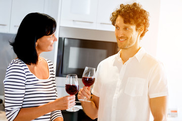 Portrait of a couple having a glass of red wine