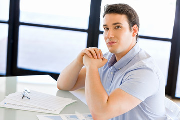 Fototapeta premium Pensive businessman at office
