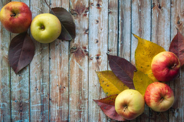 autumn composition. on autumn leaves top view on wooden background