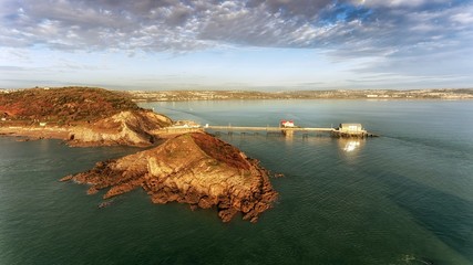 A calm morning at Mumbles Pier, an aerial view showing the new lifeboat station and the middle...