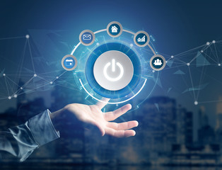 Power button symbol with computer app displayed on a futuristic interface