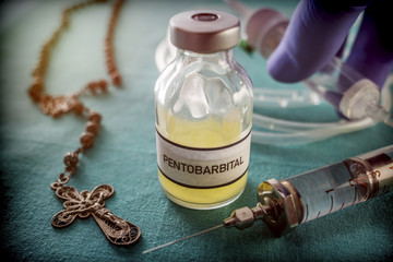 Vial with pentobarbital used for euthanasia and lethal inyecion in a hospital, conceptual image - obrazy, fototapety, plakaty