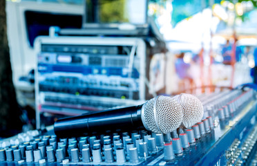 Fototapeta premium Microphone on the sound mixer.To customize audio system in the event.