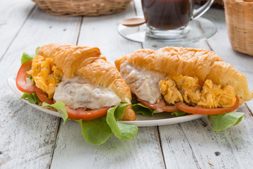 Breakfast Croissant stuffed scrambled eggs and tuna