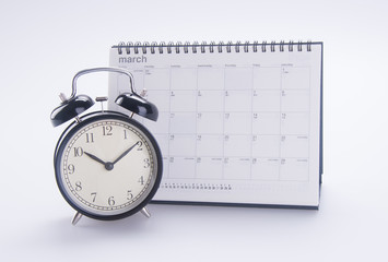 alarm clock with calendar. alarm clock with calendar on the background.