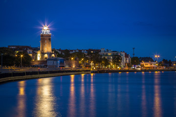 Fototapeta na wymiar Lighthouse in Baltic coast during blue hour.