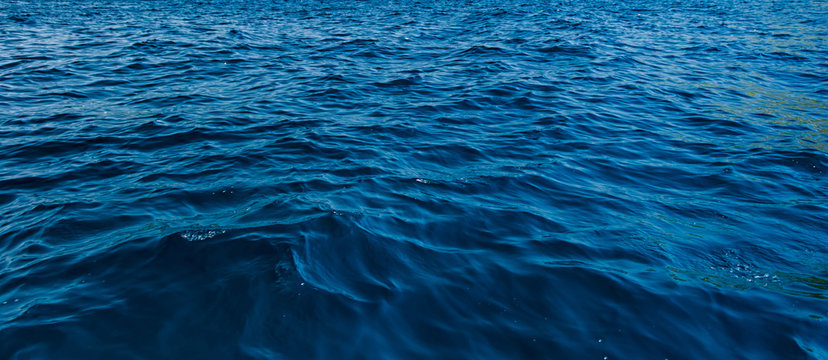 Fototapeta Blue dark water surface at open sea, Dark and deep ocean
