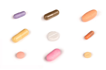 some colorful pills isolated on a white background.psd