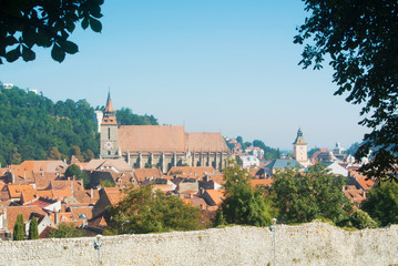 Panoramic view of Brasov medieval old town and walls from Tampa mountain, Transilvania, Romania.
