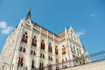 Fototapeta na wymiar Close up view to Budapest parliament building and a beautiful blue sky at the background, Hungary.