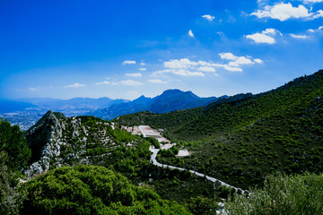 Fototapeta na wymiar Landscape. View from the top of the mountain to the coastline of North Cyprus and the wall of the Castle of St. Hilarion. Cyprus, the castle of St. Hilarion