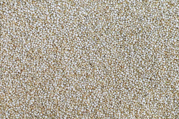 Quinoa seeds background.