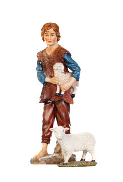 Figure of the shepherd with a sheep for the nativity portal