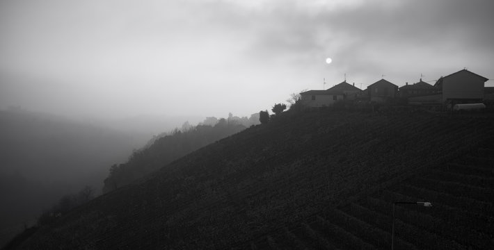 Fototapeta Sunset over Langhe hills. Black and white photo