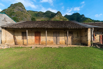 Fototapeta na wymiar Hill tribe houses in Vietnam with beautiful mountains and skies.