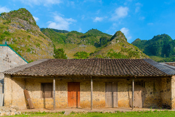 Fototapeta na wymiar Hill tribe houses in Vietnam with beautiful mountains and skies.