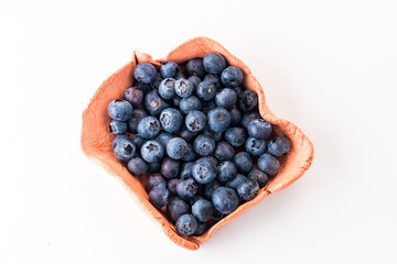 Fresh blueberries isolated on white