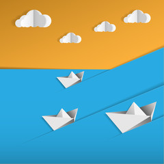Paper boat floats on paper waves and paper clouds