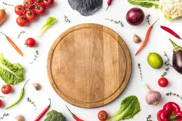 Fotobehang wooden board among vegetables © LIGHTFIELD STUDIOS