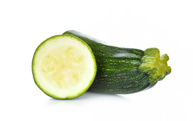 fresh green zucchini on white background