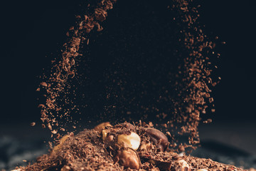 Falling shredded chocolate pieces