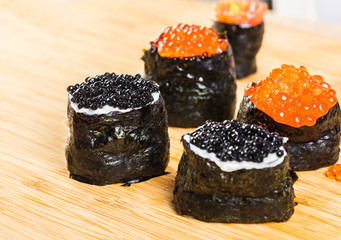 Chef prepares rolls, hands closeup