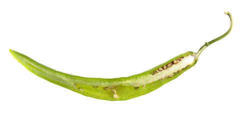 Green chili pepper cut in half inside longitudinal section isolated on white background