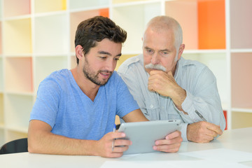 young startup businessman making presentation of project to senior investior