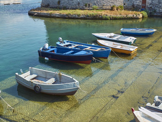 Fishing boats moored in fishing port of Gallipoli. Puglia, Italy.