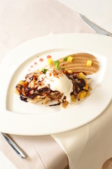 Restaurant dessert with ice-cream and chocolate syrup