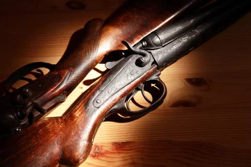 Rolgordijnen Old Hunting Shotguns © cosma